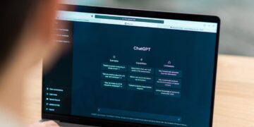 ChatGPT user on a laptop. Conversational AI, artificial intelligence.