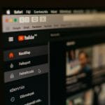 YouTube on a screen. YouTube interface, web navigation. Online video platform.