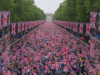 Crowd with British flags in London. Political demonstration near the Arc de Triomphe.