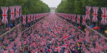 Crowd with British flags in London. Political demonstration near the Arc de Triomphe.