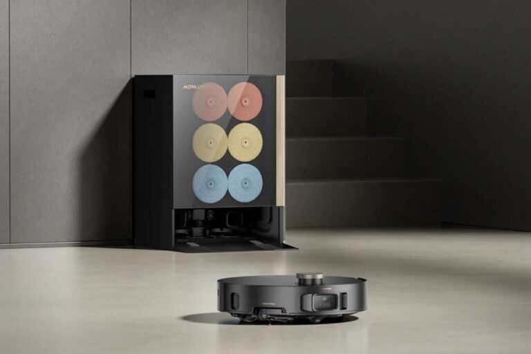 Robot aspirateur noir avec station de nettoyage et disques colorés. Nettoyage intelligent. #robotaspirateur