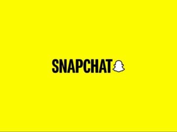 Snapchat logo on yellow background. Popular social media application.